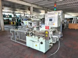 آلتان مستعملتان لتعبئة المنتجات بتقنية التدفق